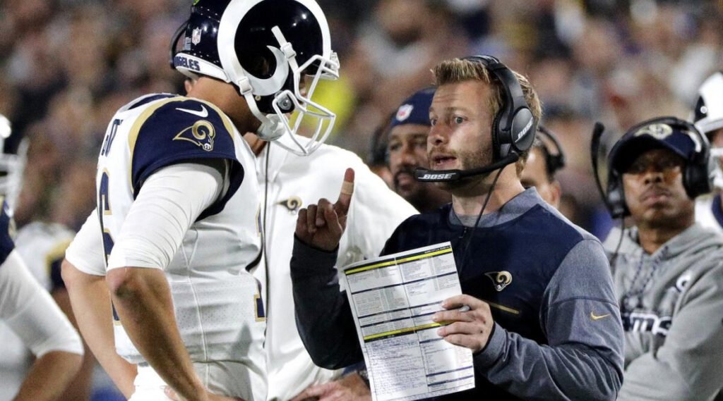 NFL head coach on sideline during game